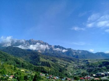 Scenic view of mt kinabalu against cloudy sky