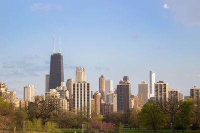 View of buildings in city against sky