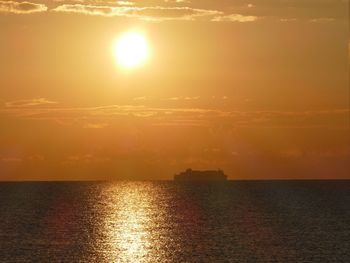 Scenic view of sea at sunset