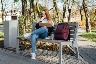 Mental health. work-life balance, online work job or education. redhead woman working typing on