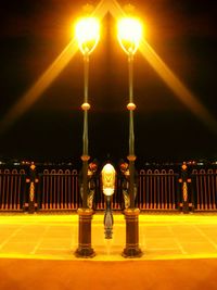 Illuminated street light at night