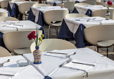 Empty chairs and table in restaurant