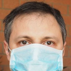 Close-up of man wearing mask