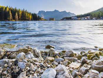 Magical reflections on the misurina lake. sunsets on the dolomites.