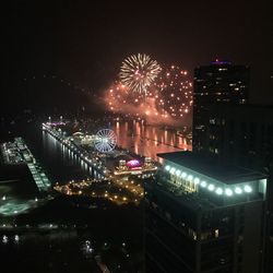 Fireworks in city at night