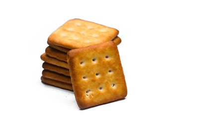 Close-up of bread against white background