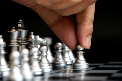 Close-up of human hand against blurred background