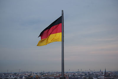 Low angle view of flag against sky