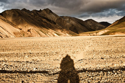 Shadow of man on mountain