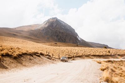 Scenic view of desert against sky