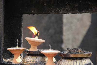 Close-up of burning diya