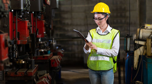 Young man working at construction site