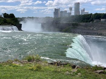 Scenic view of waterfall in city