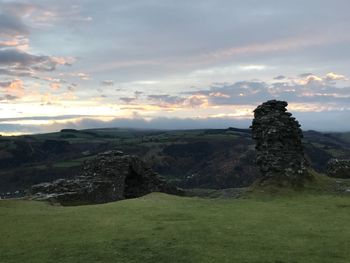 Scenic view of landscape against sky during sunset