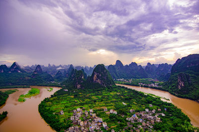 Scenic view of landscape against sky during sunset