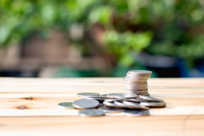 Close-up of coins on table