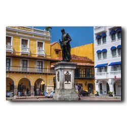 Statue in front of building