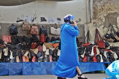 Rear view of woman with umbrella