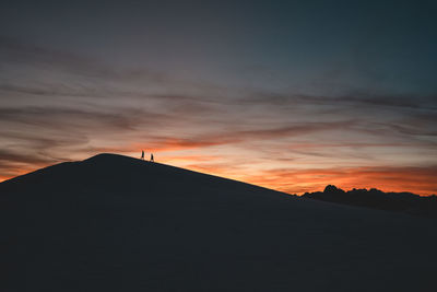 Scenic view of dramatic sky during sunset