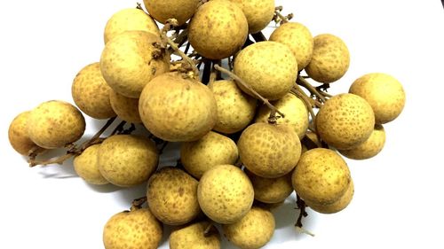 Close-up of fruits against white background