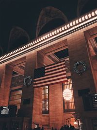 Low angle view of illuminated building at night