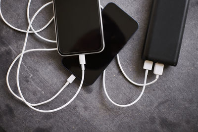 Cell phones connected to power bank