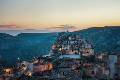 High angle view of buildings against sky during sunset