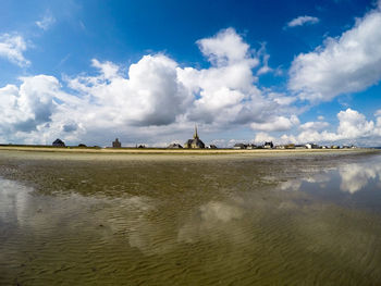 Scenic view of beach against sky