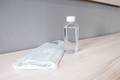 Close-up of drinking glasses on table