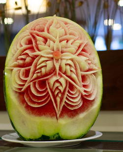 Close-up of fruits in plate on table