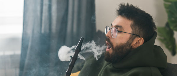 Young man smoking