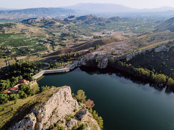 High angle view of river amidst mountains