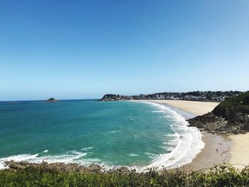 Scenic view of sea against clear sky