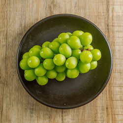 High angle view of fruits in plate on table