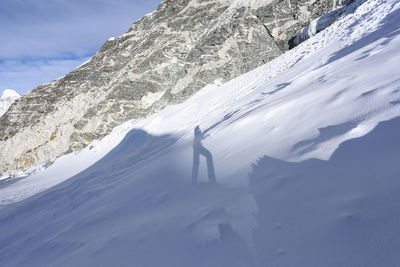 Scenic view of snow covered mountains