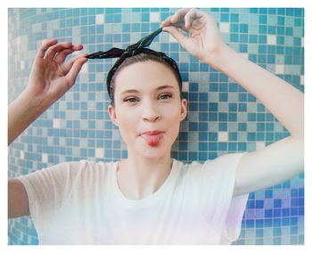 Portrait of a young woman in bathroom