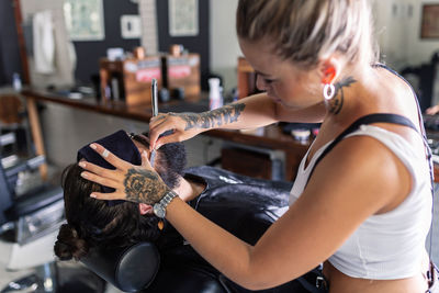 Midsection of man working