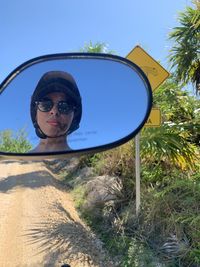 Portrait of young woman in sunglasses