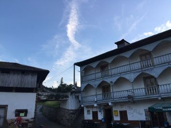 Low angle view of houses against sky