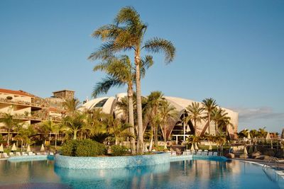 View of swimming pool against clear sky
