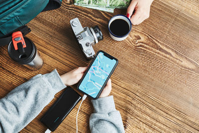 Planning vacation trip. searching travel destination using navigation map on smartphone. vacations