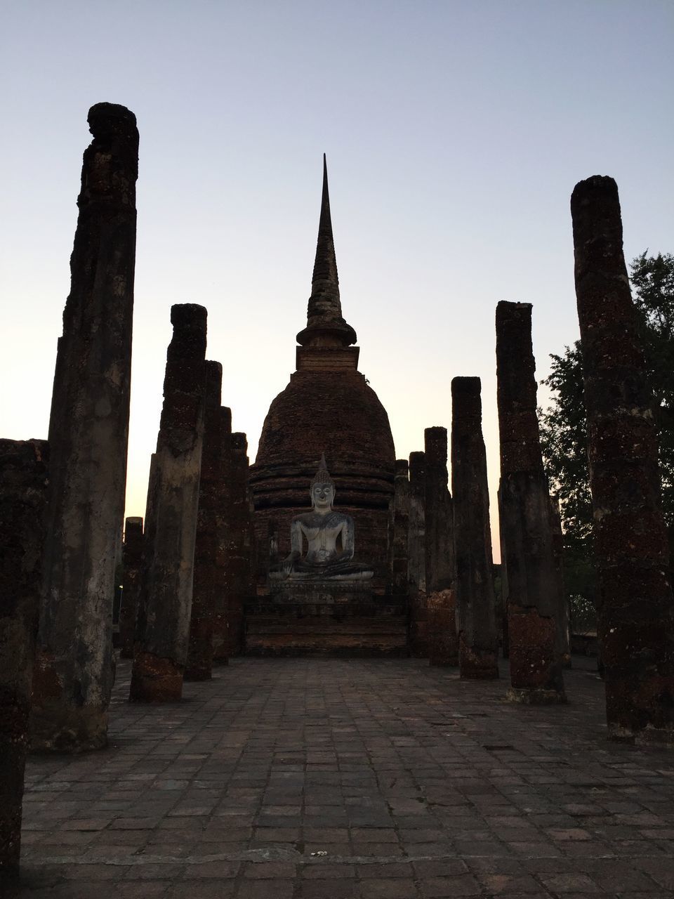 OLD TEMPLE AGAINST BUILDING