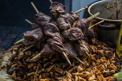 High angle view of meat on barbecue