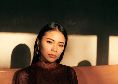 Close-up portrait of beautiful young asian woman with fabric props