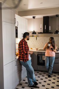 Side view of man working at home