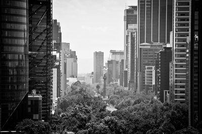 Modern buildings in city against sky