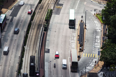 High angle view of vehicles moving on roads