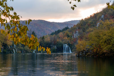 Scenic view of lake against sky during autumn