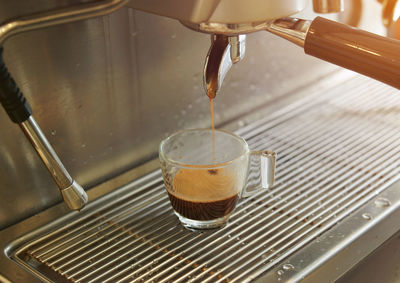 Close-up of coffee cup on table