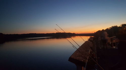 View of calm lake at sunset